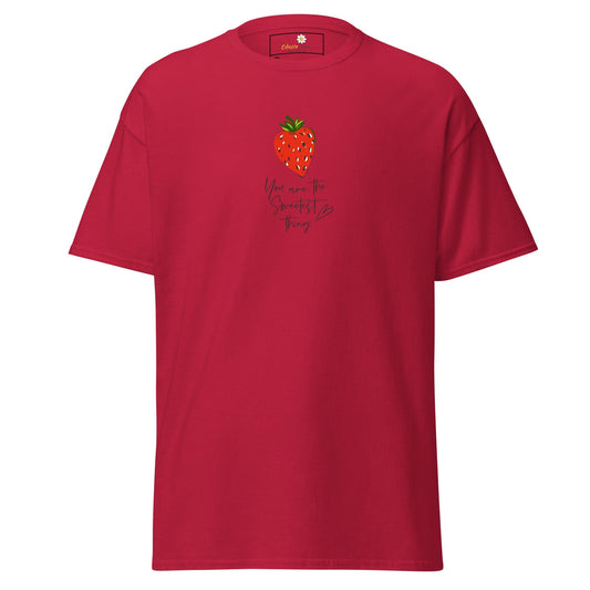 Red t-shirt with strawberry graphic.