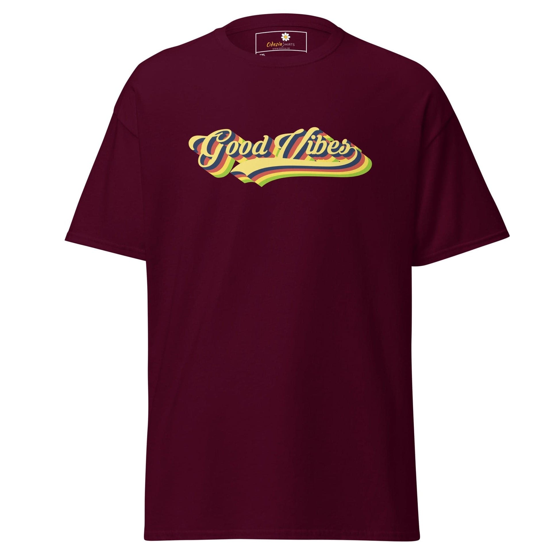 Maroon t-shirt with ’Good Vibes’ graphic.